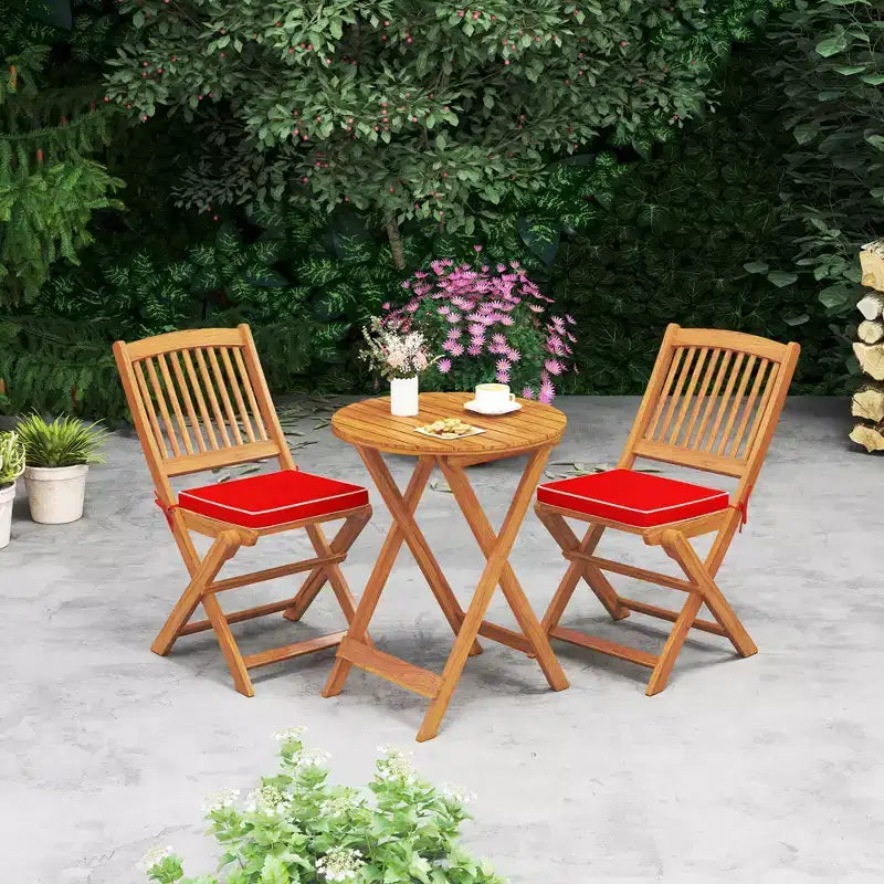 Set di 4 sedie pieghevoli da esterno Costway con schienale alto in legno di acacia e cuscini di seduta beige/blu navy/rosso