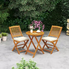 Set di 4 sedie pieghevoli da esterno Costway con schienale alto in legno di acacia e cuscini di seduta beige/blu navy/rosso