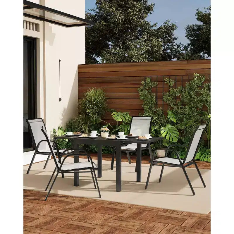 Set di 4 sedie da pranzo impilabili, set di sedie da pranzo per patio con schienale alto, sedie da esterno con tessuto in textilene e struttura in metallo per prato, cortile, terrazza e giardino