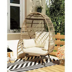 Poltrona a uovo oversize in rattan da esterno con struttura in acciaio e 4 cuscini per patio, portico, cortile, salotti