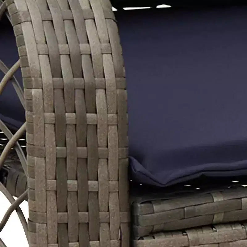 vidaXL Sedia a dondolo da giardino con cuscini Rattan sintetico grigio - Grigio e blu