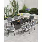 Set da pranzo da esterno TROPOW, tavolo in metallo nero 150x90cm con piano in vetro temperato e 6 sedie in vimini, set tavolo e sedie da patio con cuscini grigi
