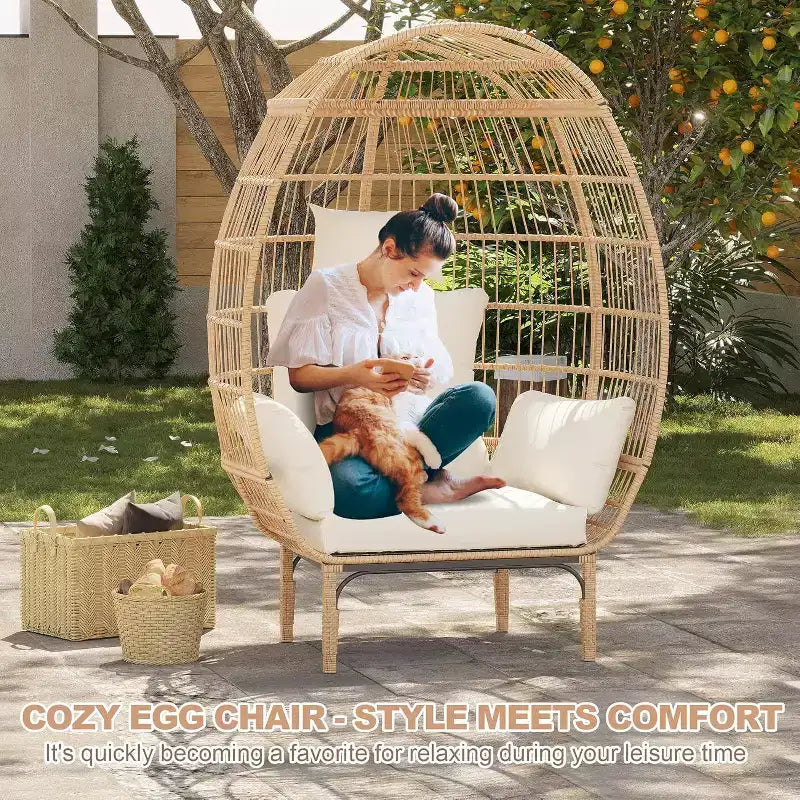 Wicker Egg Chair - Waterproof rattan egg chair with thick seat cushion, hand-woven rattan, galvanized frame, and non-slip feet - for gardens, porches