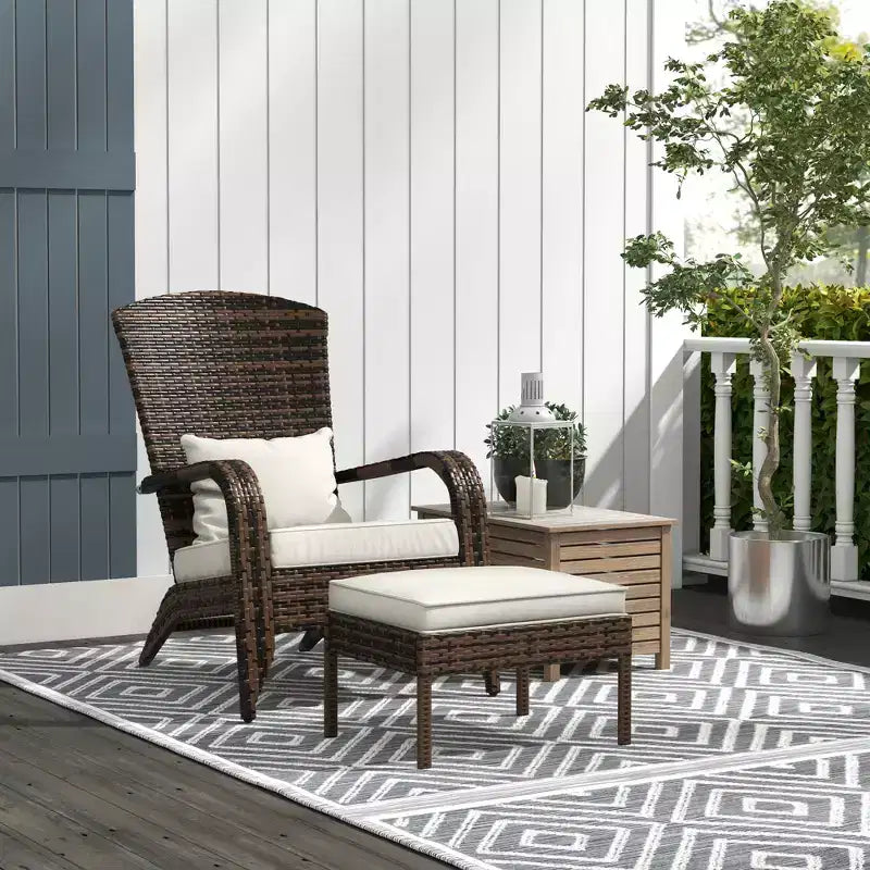Sedia Adirondack in vimini per braciere con pouf e cuscini