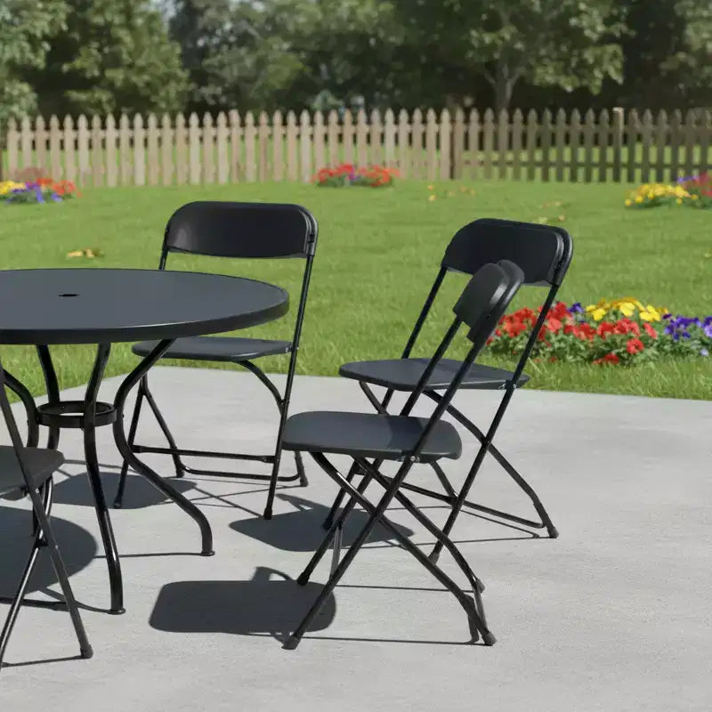 HomeRoots Set di Quattro Sedie da Pranzo Pieghevoli Impilabili da Esterno in Metallo Nero