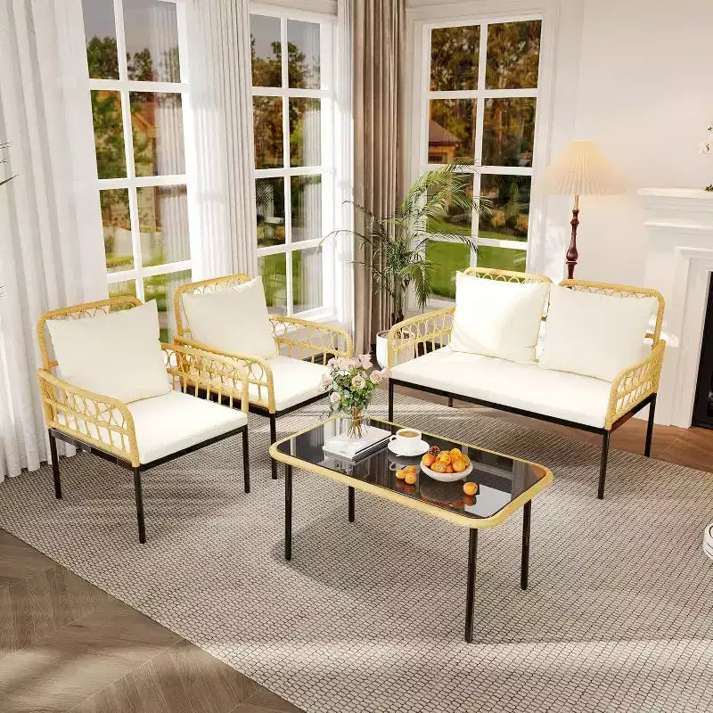 Set da esterno in 4 pezzi stile Boho - Divanetto in rattan sintetico per tutte le stagioni, Robusta struttura in metallo, Tavolino in vetro e Cuscini spessi