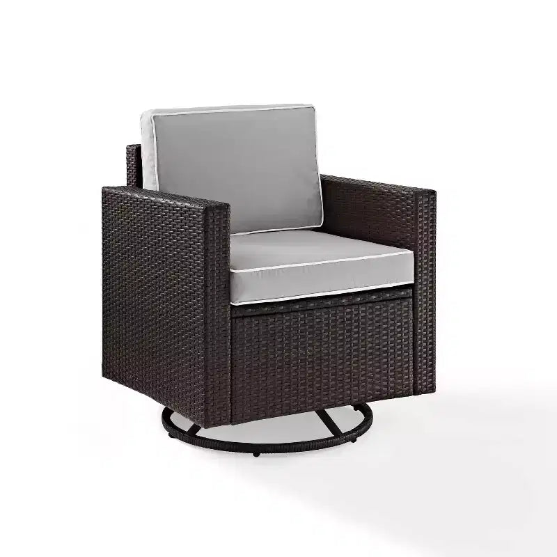Poltrona a dondolo girevole da esterno in vimini Palm Harbor con cuscino - Marrone - Crosley
