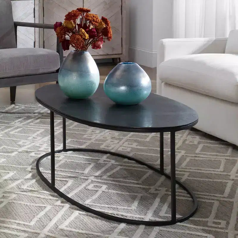 Tavolino da caffè ovale Uttermost Modern Industrial Aged Black Iron Aluminum, 48 x 24, con ripiano placcato anticato per soggiorno e camera da letto