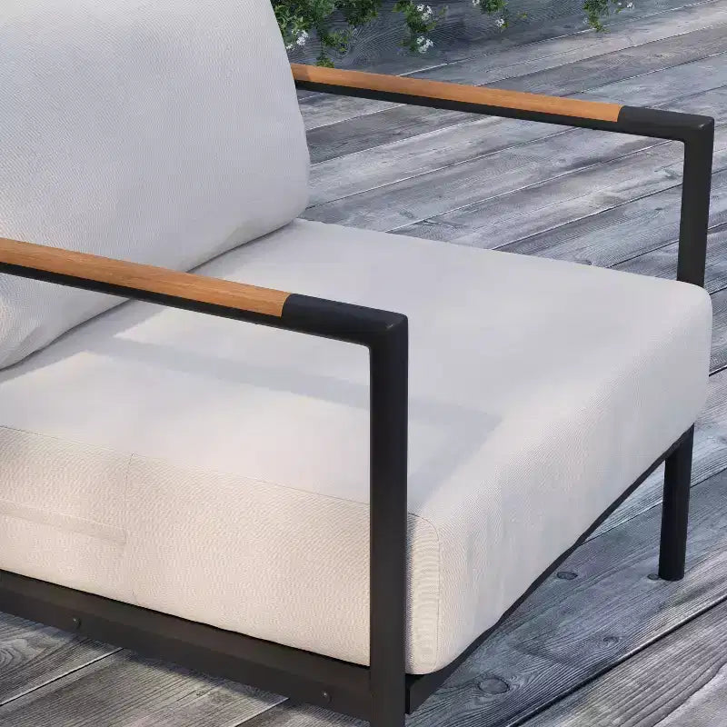 Poltrona da esterno Merrick Lane con cuscini in peluche rimovibili e struttura in alluminio con dettagli in teak