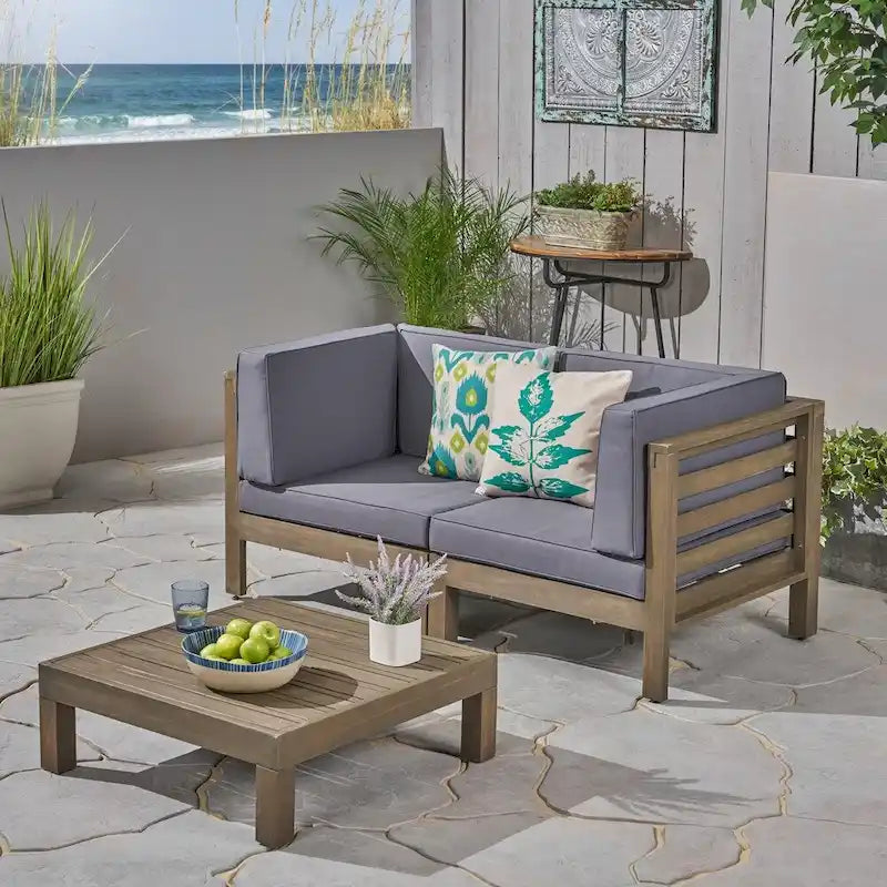 Oana Outdoor 2-Seater Acacia Wood Sectional Loveseat and Coffee Table Set with Cushions by Christopher Knight Home