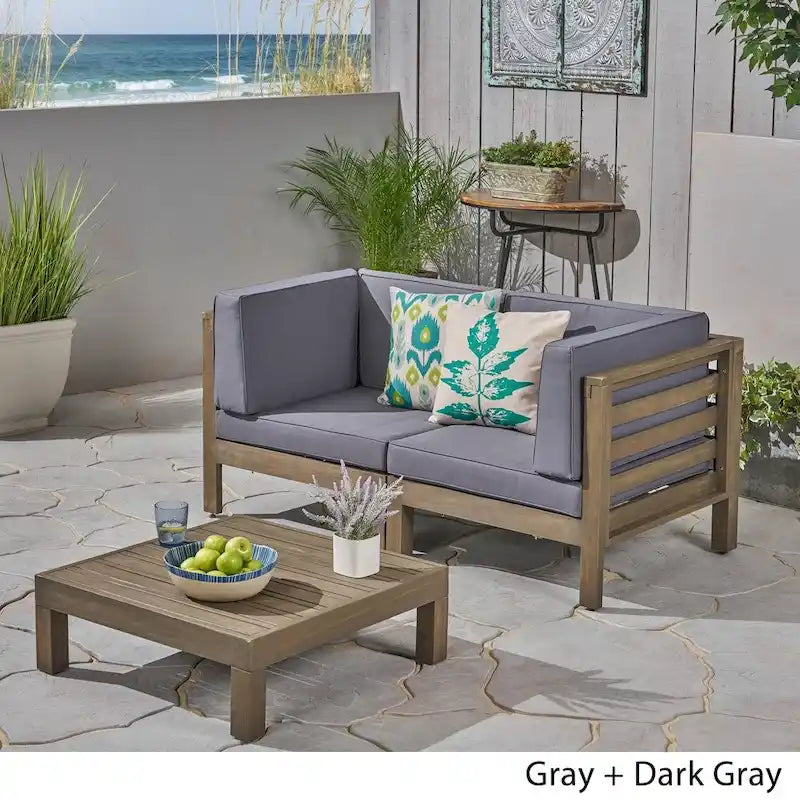 Oana Outdoor 2-Seater Acacia Wood Sectional Loveseat and Coffee Table Set with Cushions by Christopher Knight Home