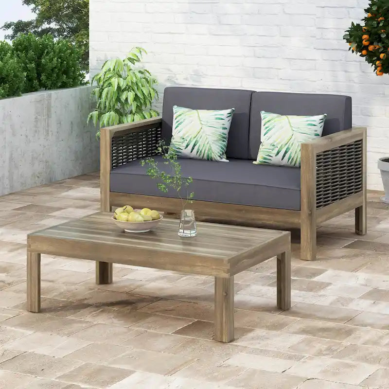 Set divanetto e tavolino da caffè Linwood in legno di acacia e vimini con cuscini per esterni di Christopher Knight Home