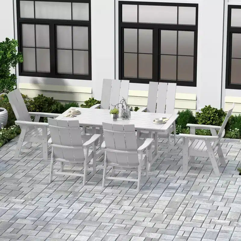 Set da pranzo da esterni WestinTrends da 7 pezzi con tavolo e moderne sedie a sdraio Adirondack